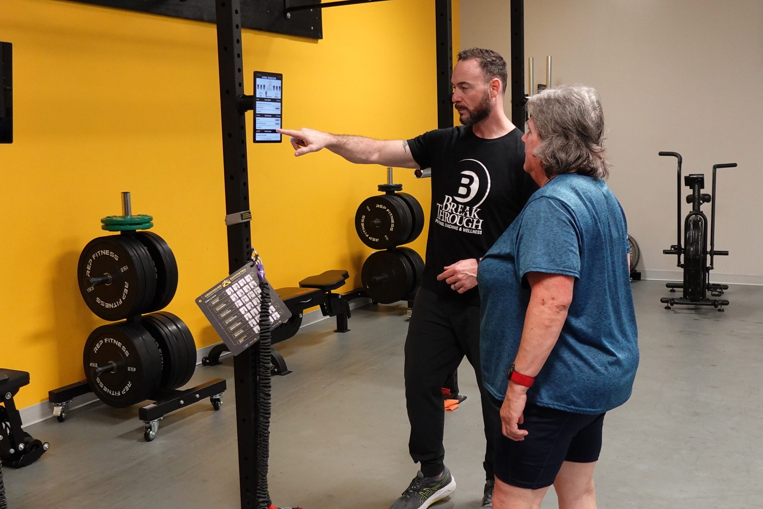 50 Year Old Woman Getting Personalized Strength Coaching