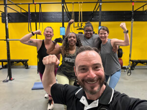 IMG_4581-(1) Group of adults in Dover, DE smiling after a personal training strength workout session